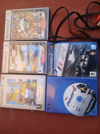 Console PlayStation 2 con giochi e accessori