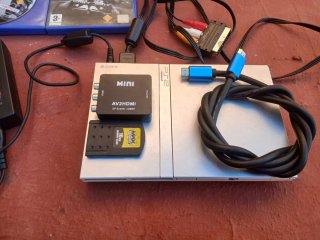 Console PlayStation 2 con giochi e accessori
