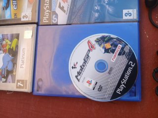 Console PlayStation 2 con giochi e accessori