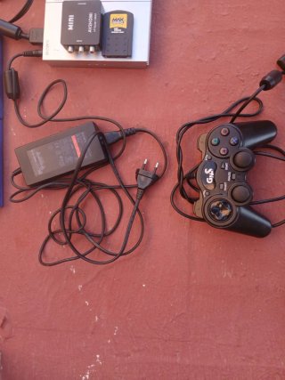 Console PlayStation 2 con giochi e accessori