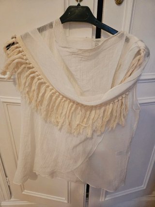 Camisa sin mangas con flecos