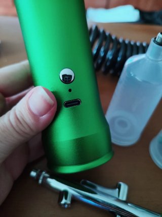 Aerógrafo verde con accesorios