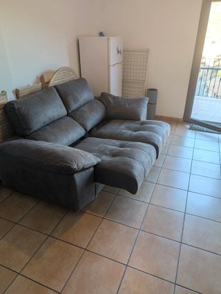 Sofá reclinable extensible gris