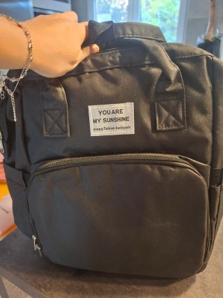 Mochila convertible en cuna/cambiador