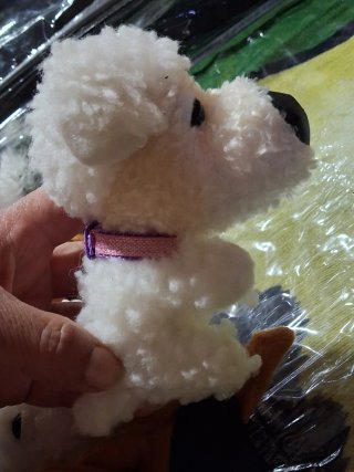 Perro de peluche blanco