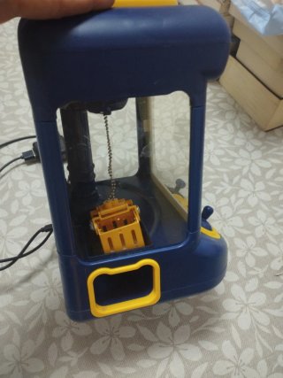 Máquina de muñecas con luz y sonido