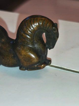 Miniatura antigua de cobre caballo echado