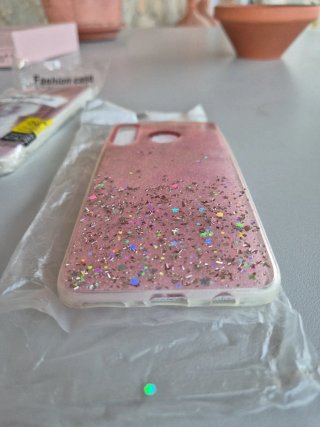 Funda móvil rosa con purpurina