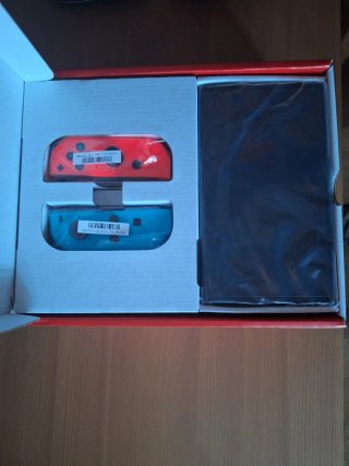 Nintendo Switch OLED + Funda Mario Odyssey