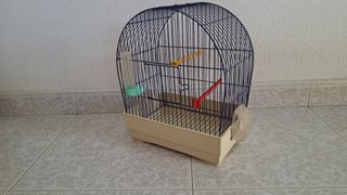 Jaula para pájaros azul y beige