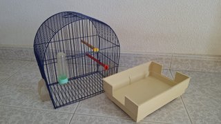 Jaula para pájaros azul y beige