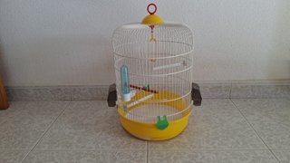 Jaula para pájaros con bandeja