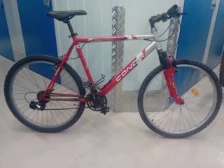 Bicicleta de montaña CONOR roja en venta