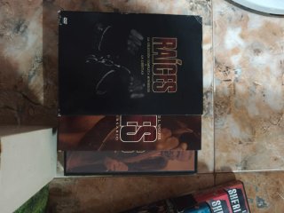 DVD Raíces y Sherlock Holmes