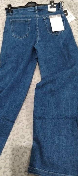 Pantalón vaquero ancho tiro alto