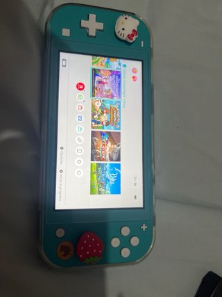 Nintendo Switch Lite Verde con juegos