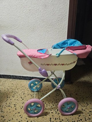 Cochecito de muñecas rosa y azul