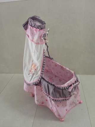 Cuna de juguete rosa