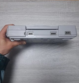 PlayStation 1 gris con Memory Card y accesorios