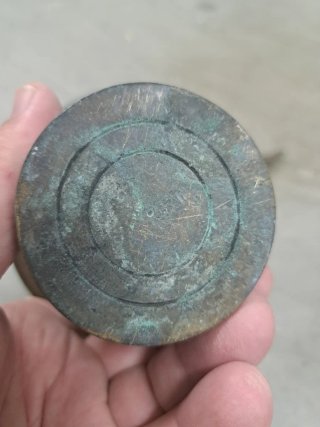 Mortero y mano de bronce antiguo