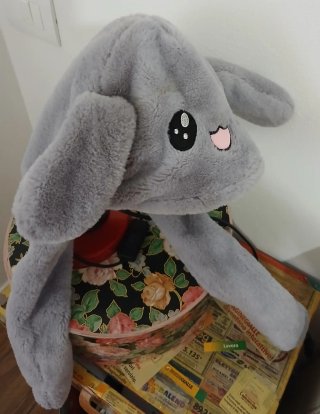 Cappello coniglio peluche orecchie si muovono