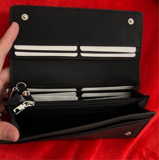 Cartera Desigual negra con diseño floral