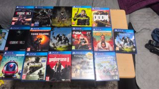 PS4 con 2 mandos y juegos