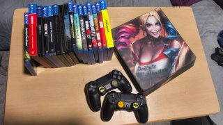PS4 con 2 mandos y juegos