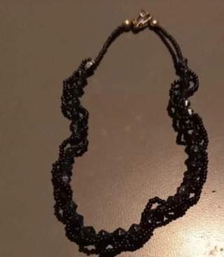 Set braccialetti neri e argento