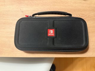 Nintendo Switch OLED Super Mario + funda + SSD