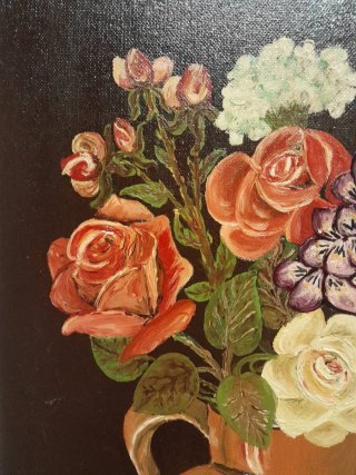 Óleo de flores en jarrón de terracota