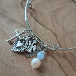 Bracciale con ciondoli religiosi
