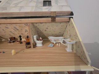 Casa de muñecas con accesorios