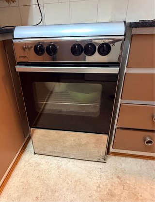 Cocina de gas Rommer 4 fuegos con horno y grill