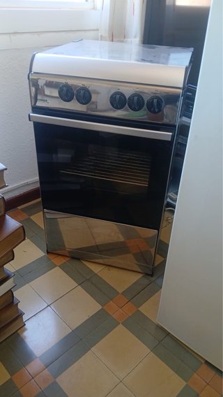 Cocina de gas Rommer 4 fuegos con horno y grill