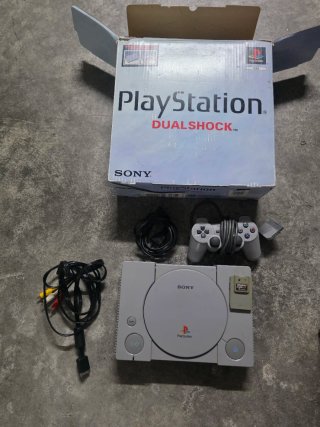 PlayStation 1 DualShock gris