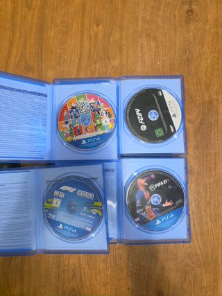 PS4 (PlayStation 4) Negra + Accesorios y Juegos
