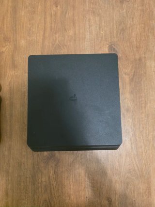PS4 (PlayStation 4) Negra + Accesorios y Juegos