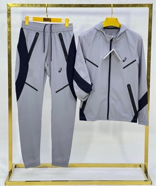 Conjunto deportivo Asics gris y negro