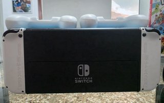 Nintendo Switch OLED + juego + accesorios