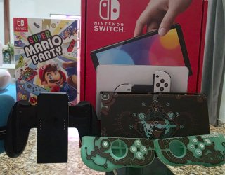 Nintendo Switch OLED + juego + accesorios
