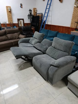 Sillón eléctrico gris y turquesa
