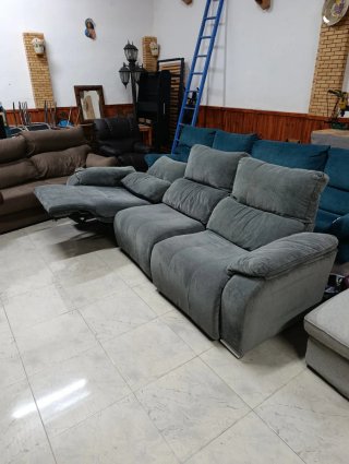 Sillón eléctrico gris y turquesa