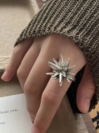 Anillo Punk Chic pinchos móviles Ajustable