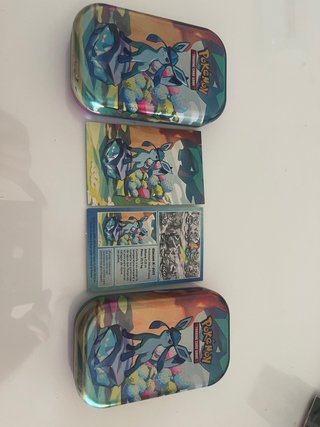 Pokemon tcg latas vacías+ carta de info de glaceon