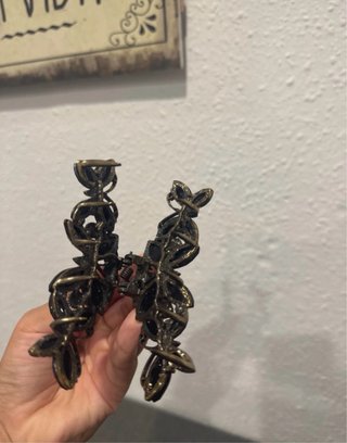 Pinza de pelo mariposa negra y dorada
