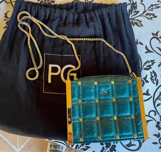 Bolso Purificación García verde y dorado
