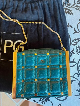 Bolso Purificación García verde y dorado