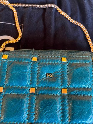 Bolso Purificación García verde y dorado