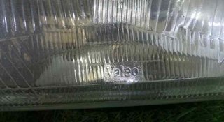 564306 faro derecho ford fiesta berl./courier *